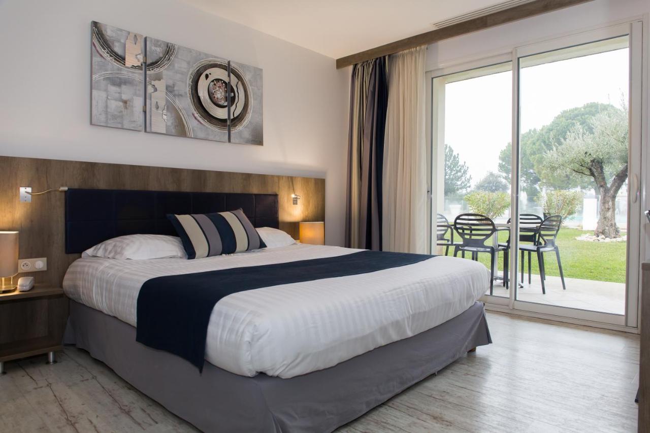 Le Domaine Des Oliviers Hotel Pierrelatte Bagian luar foto